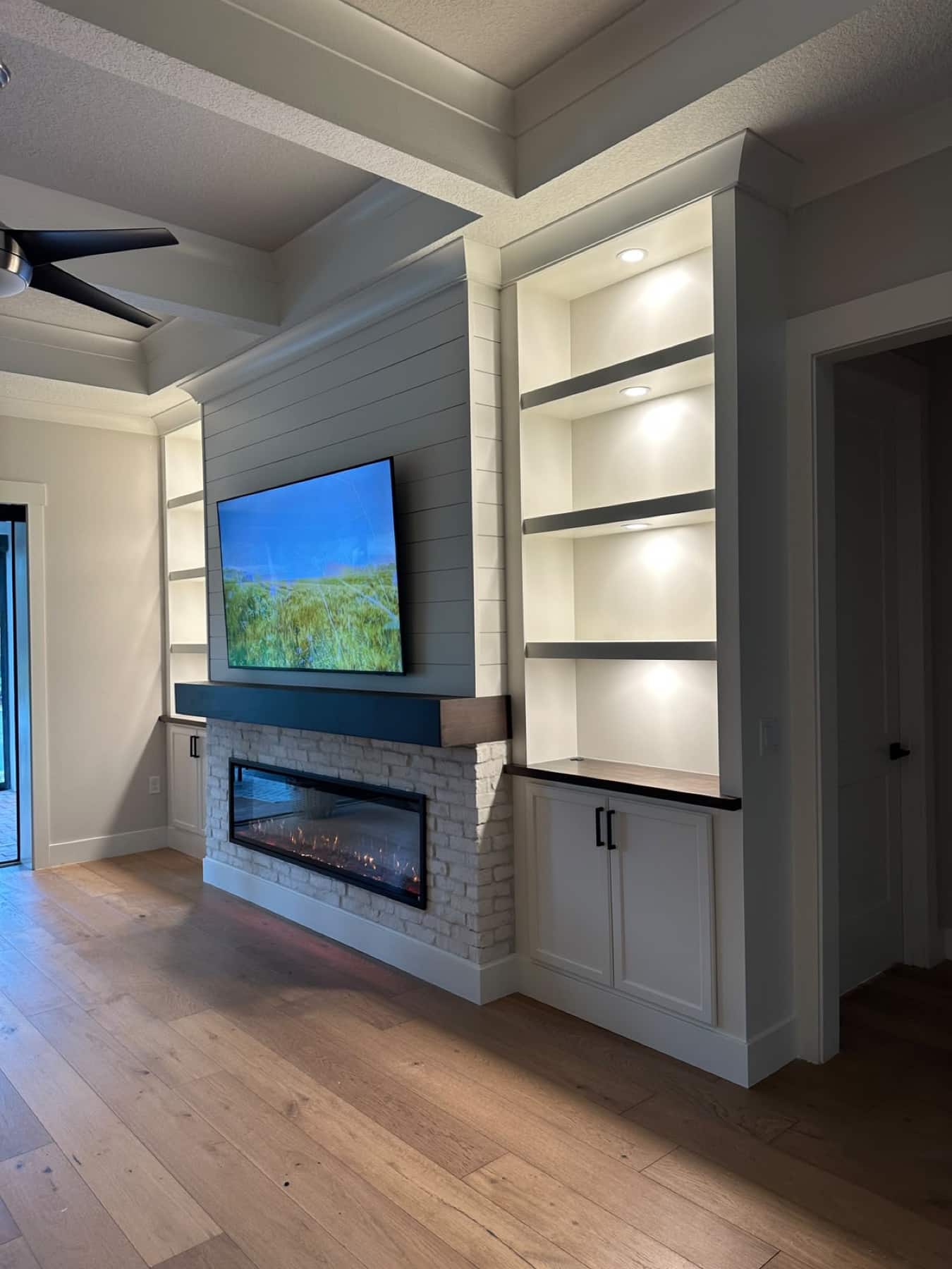 Orlando shiplap and brick media wall with cabinetry — fireplace walls florida